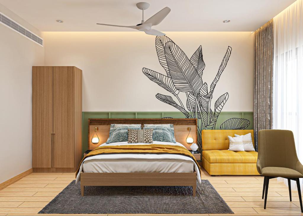 a bedroom with a bed and a plant on the wall at Hotel Bawa Regency in Mumbai
