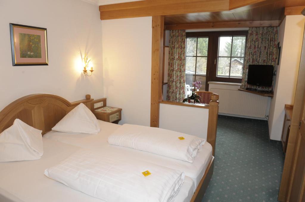 Postel nebo postele na pokoji v ubytování Hotel Stegmühlhof
