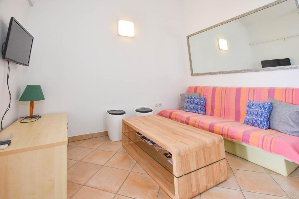 TV a/nebo společenská místnost v ubytování Apartments Taya