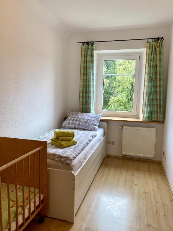 Postel nebo postele na pokoji v ubytování Ferienhof Weber Nieratz