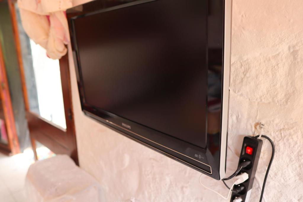 TV a/nebo společenská místnost v ubytování Mdiq Chalet