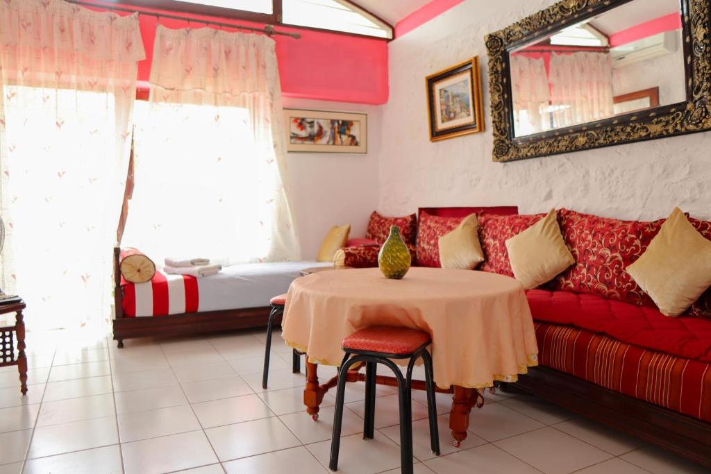 Posezení v ubytování Mdiq Chalet