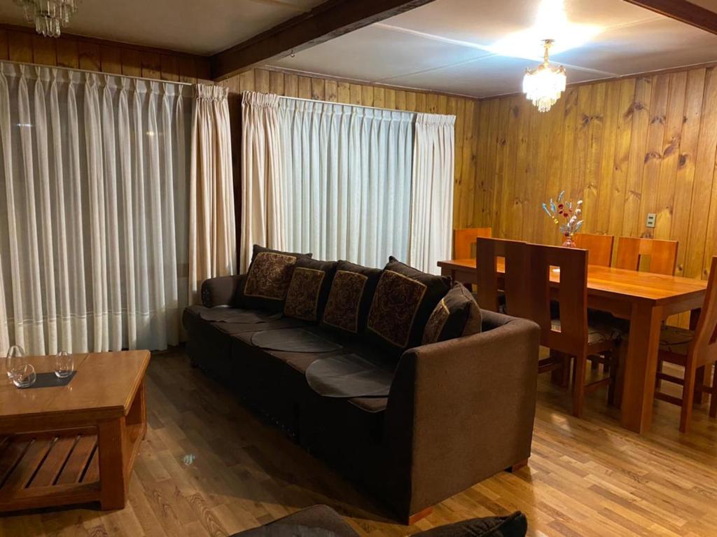 Posezení v ubytování Hostal & Cabañas Don Juan