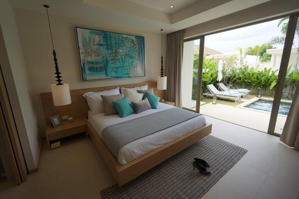 Postel nebo postele na pokoji v ubytování Superbe villa tropicale avec piscine privée Phuket
