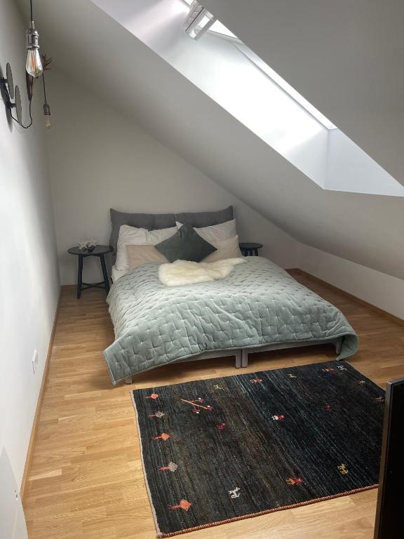Postel nebo postele na pokoji v ubytování Larix Apartment