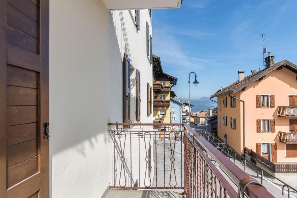 an apartment balcony with a view of a street at Appartamento Edik in Folgaria