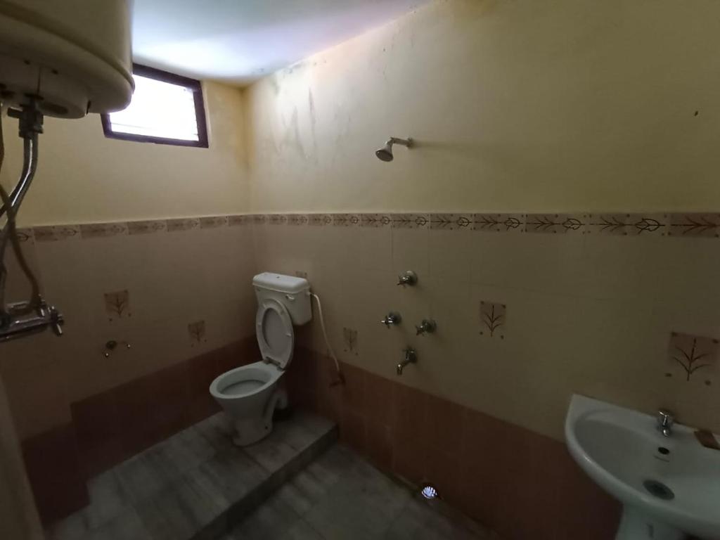 Un baño de Hotel Pemathang