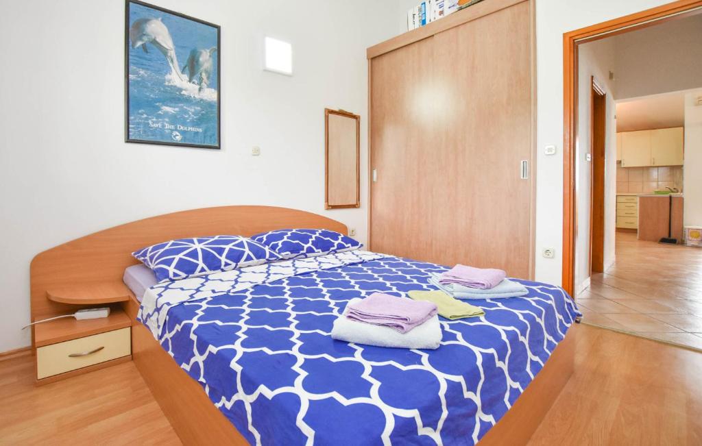Postel nebo postele na pokoji v ubytování Apartments Taya