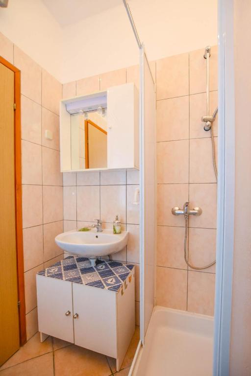 Koupelna v ubytování Apartments Taya