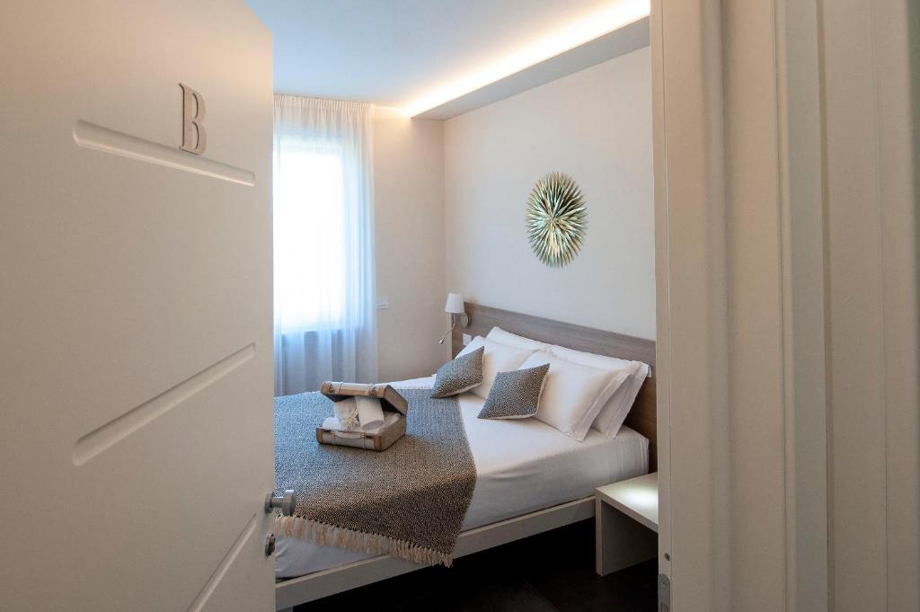 Posteľ alebo postele v izbe v ubytovaní Brichett Deluxe Rooms