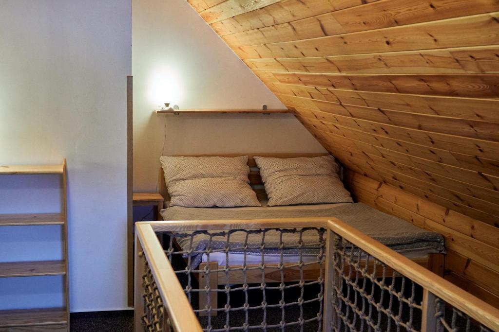Postel nebo postele na pokoji v ubytování Apartmány Pod Stráni