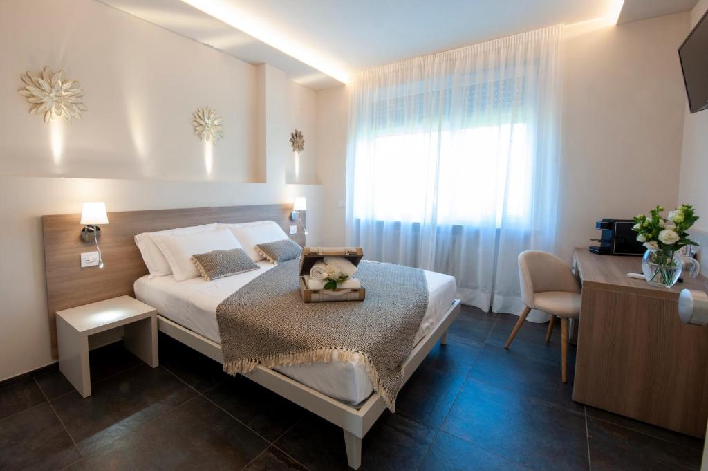 Posteľ alebo postele v izbe v ubytovaní Brichett Deluxe Rooms