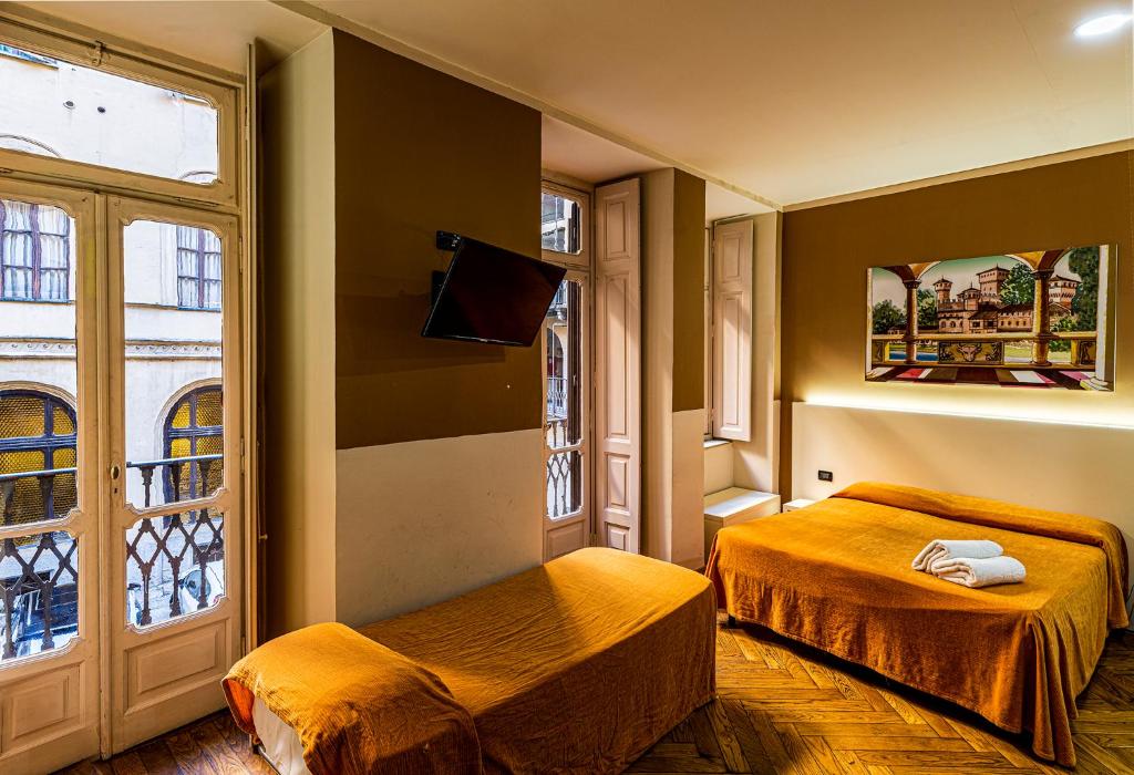 TV a/nebo společenská místnost v ubytování Hotel Antica Dogana