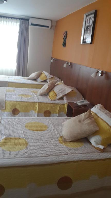 Postel nebo postele na pokoji v ubytování Hotel Mitru - Tarija