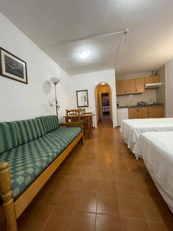Postel nebo postele na pokoji v ubytování Apartamentos Los Tarajales
