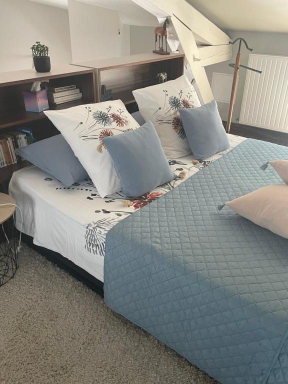 Postel nebo postele na pokoji v ubytování La Suite Alain