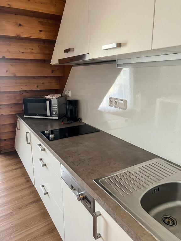 Kuchyň nebo kuchyňský kout v ubytování Apartmán Marianna