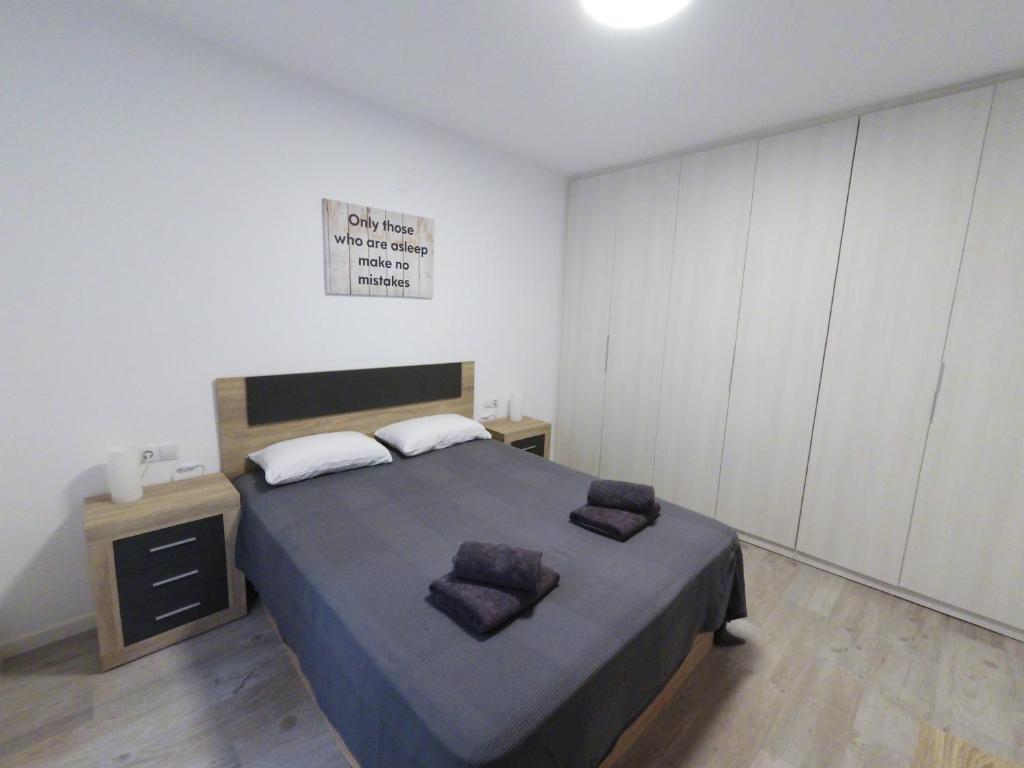 Postel nebo postele na pokoji v ubytování Apartamento New Tarraco