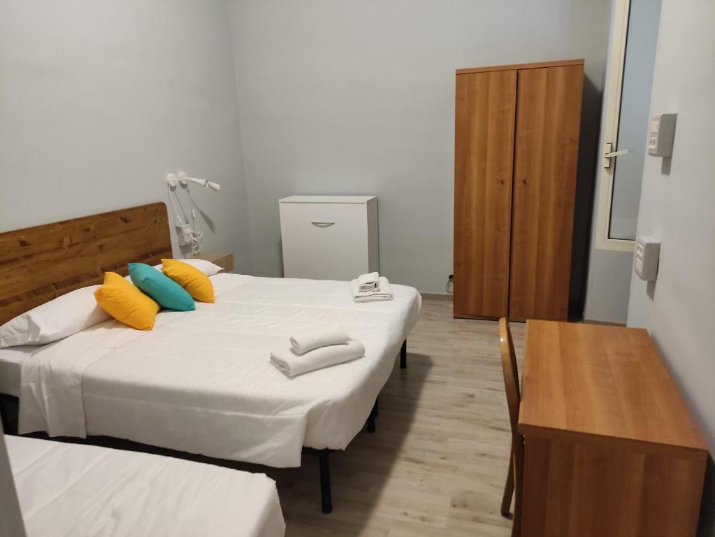Postel nebo postele na pokoji v ubytování Hotel Big Bang