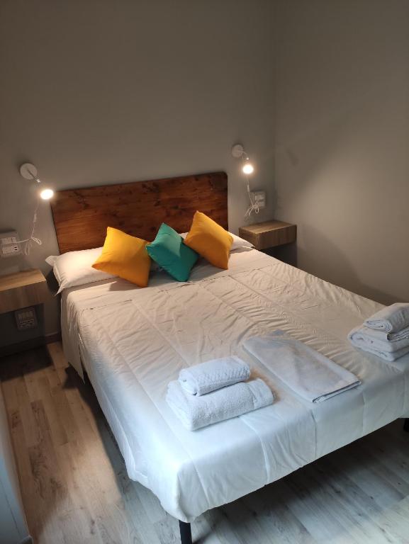 Postel nebo postele na pokoji v ubytování Hotel Big Bang