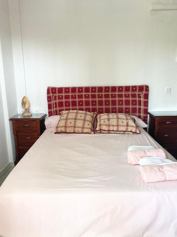 Postel nebo postele na pokoji v ubytování Apartamento Carihuela a 300 metros playa
