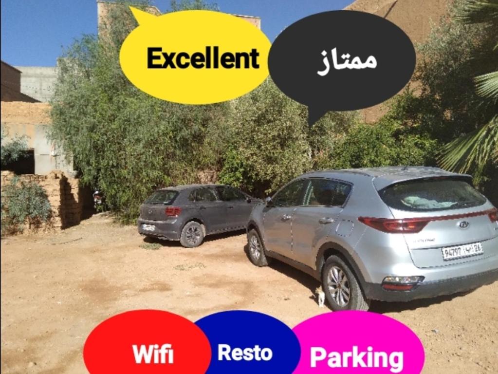 two cars parked next to each other at Hotel et Restaurant Riad Amodou in Tinerhir