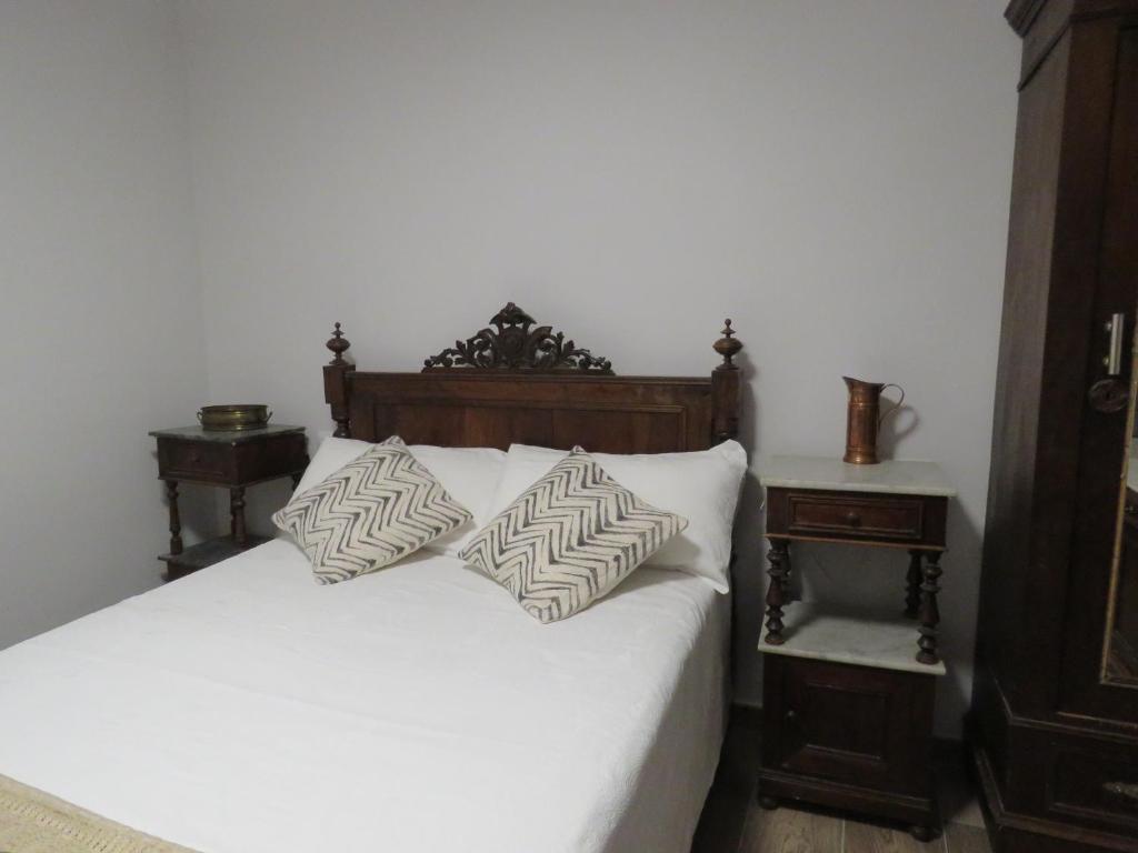 Postel nebo postele na pokoji v ubytování CASA EGIPCIA Preciosa casa centenaria en el Camino de Santiago