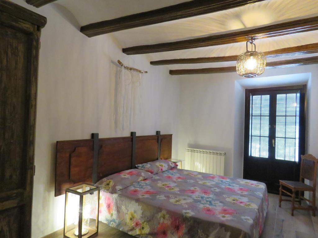 Postel nebo postele na pokoji v ubytování CASA EGIPCIA Preciosa casa centenaria en el Camino de Santiago