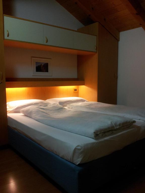 Postel nebo postele na pokoji v ubytování Chalet Karin