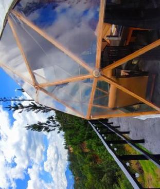 a view of the sky from the underside of an umbrella at Glamping Tausavita Ubaté Cundinamarca in El Bujío