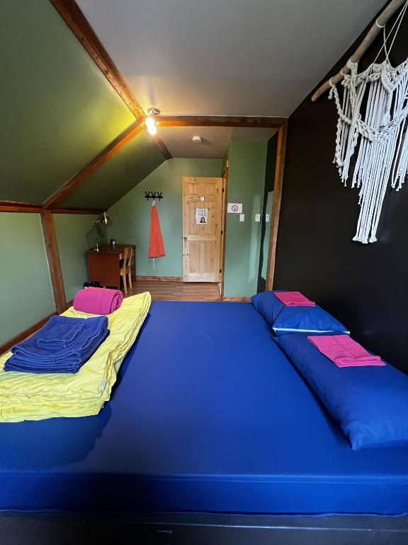 Postel nebo postele na pokoji v ubytování Chill Shack - Auberge Jeunesse