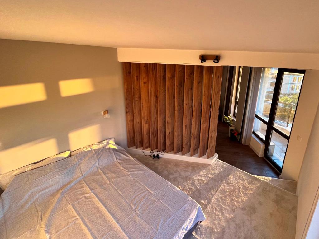 Postel nebo postele na pokoji v ubytování Apartment Bella