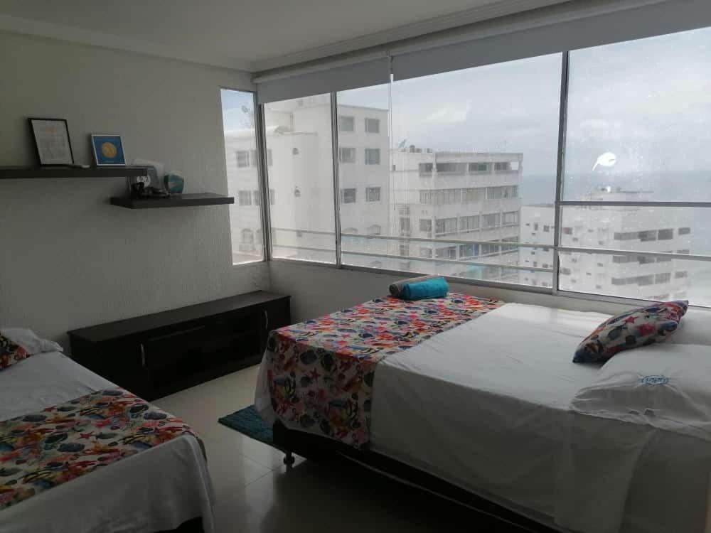 Vuode tai vuoteita majoituspaikassa Apartamento Boutique Cartagena