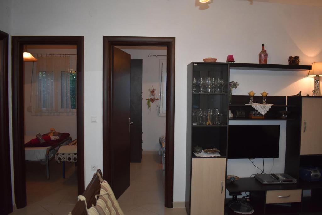 Telewizja i/lub zestaw kina domowego w obiekcie IOANNIS SEASIDE VILLA