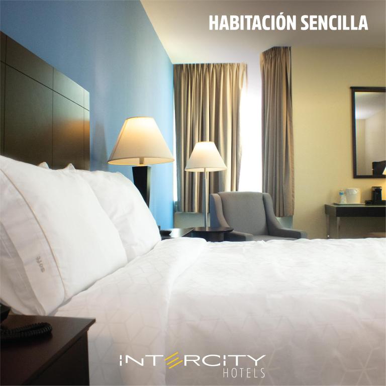 Postel nebo postele na pokoji v ubytování Intercity Hotels San Pedro Sula
