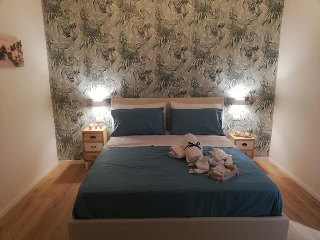 Un pat sau paturi într-o cameră la Bnb Simy2