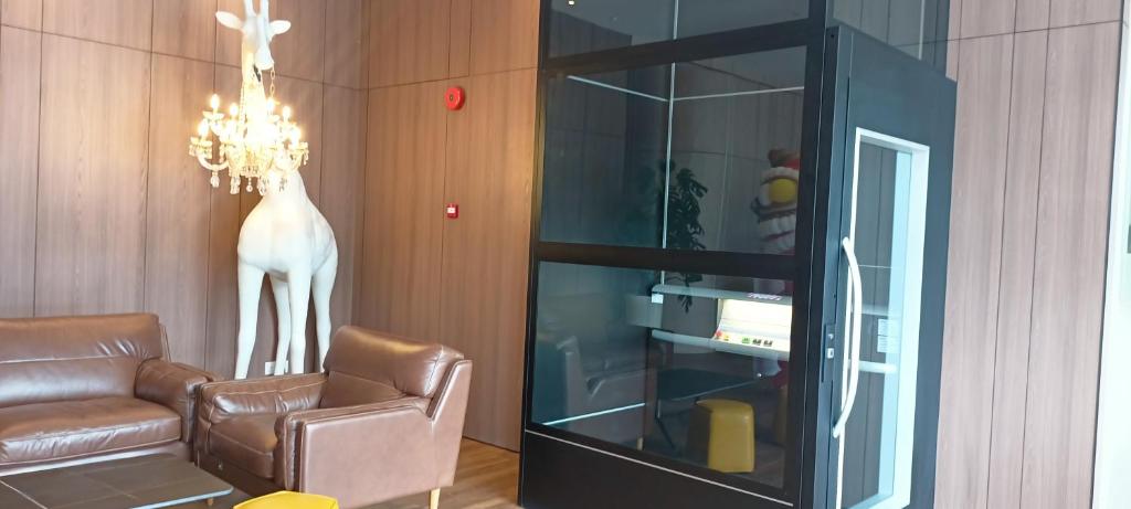 Posezení v ubytování Roxy Hotel Sri Aman