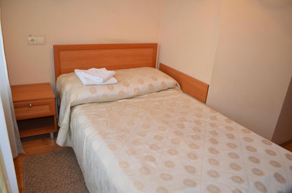 Postel nebo postele na pokoji v ubytování Predslava Hotel