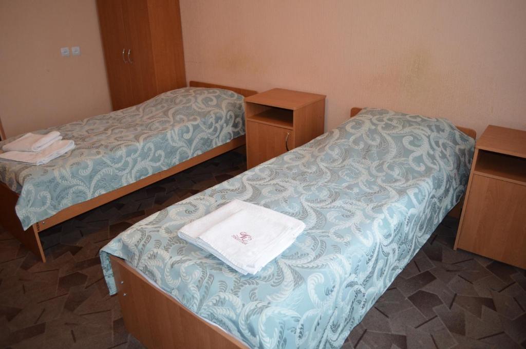Postel nebo postele na pokoji v ubytování Predslava Hotel