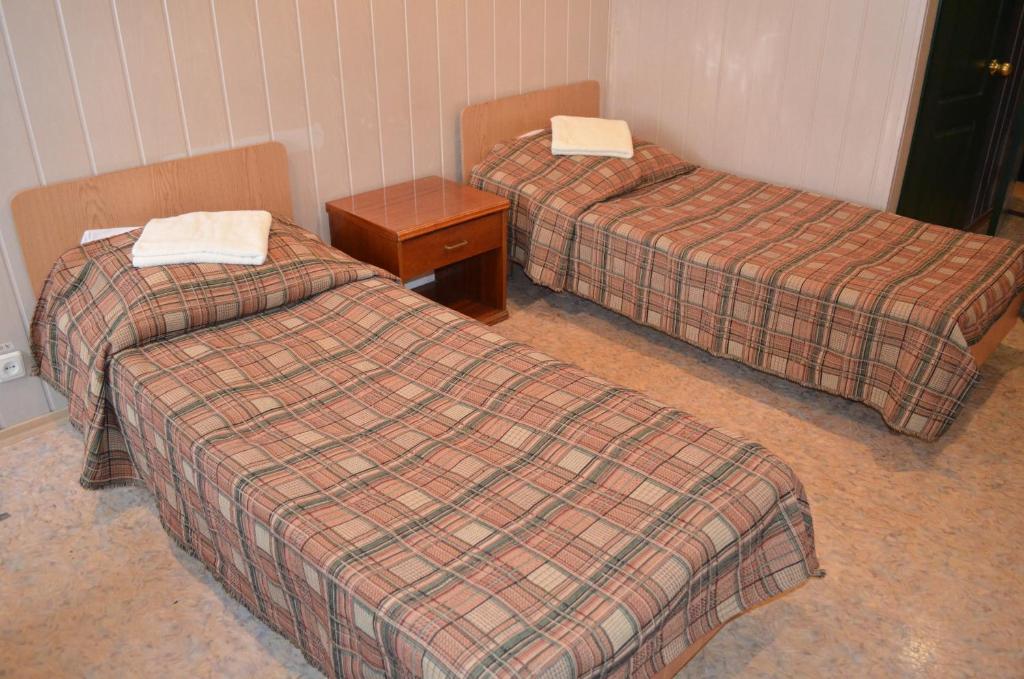Postel nebo postele na pokoji v ubytování Predslava Hotel