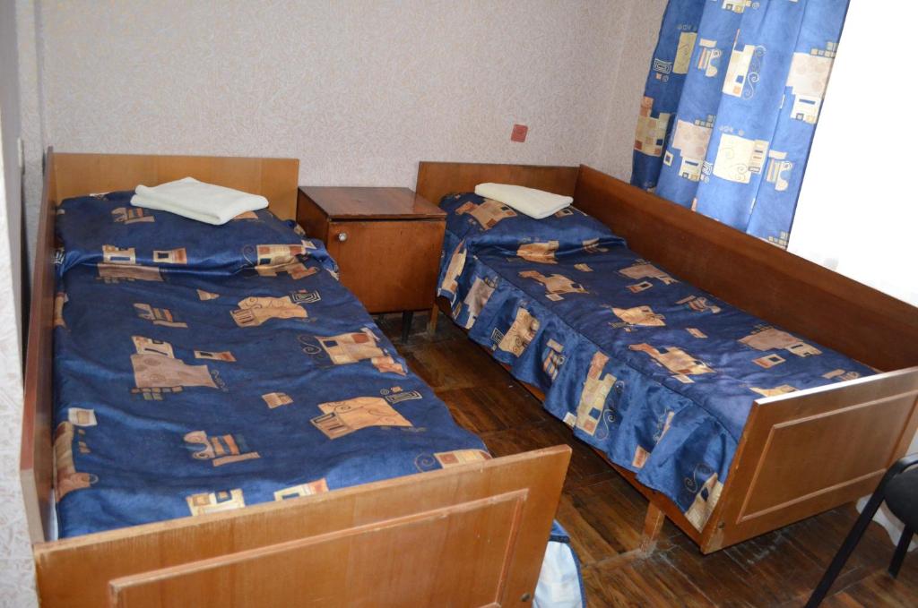 Postel nebo postele na pokoji v ubytování Predslava Hotel