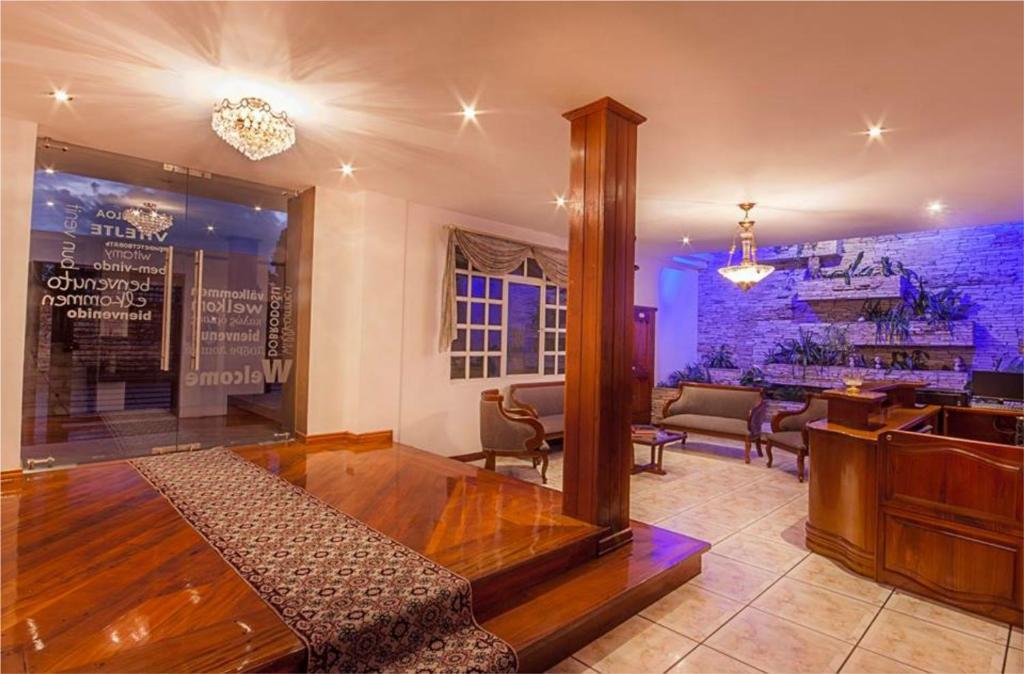 Posezení v ubytování Villa Emilia Hostal