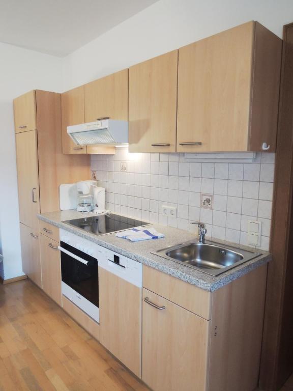 Kuchyňa alebo kuchynka v ubytovaní Aparthotel am Reitecksee