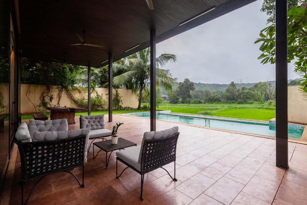 StayVista Bella Antlia 3BHK, with Pvt Pool & Paddy view- Parra, North Goa - Housity