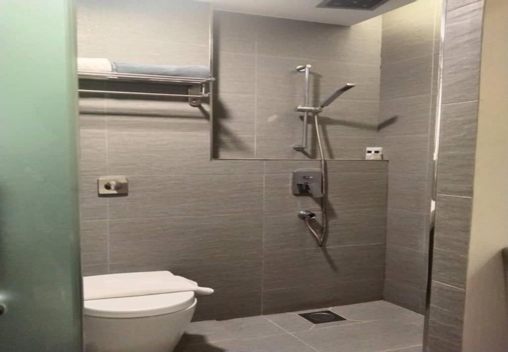 Koupelna v ubytování Minimalist Hotel