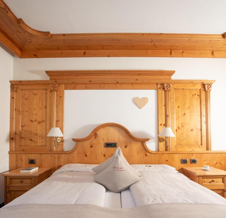 Postel nebo postele na pokoji v ubytování Hotel Galli