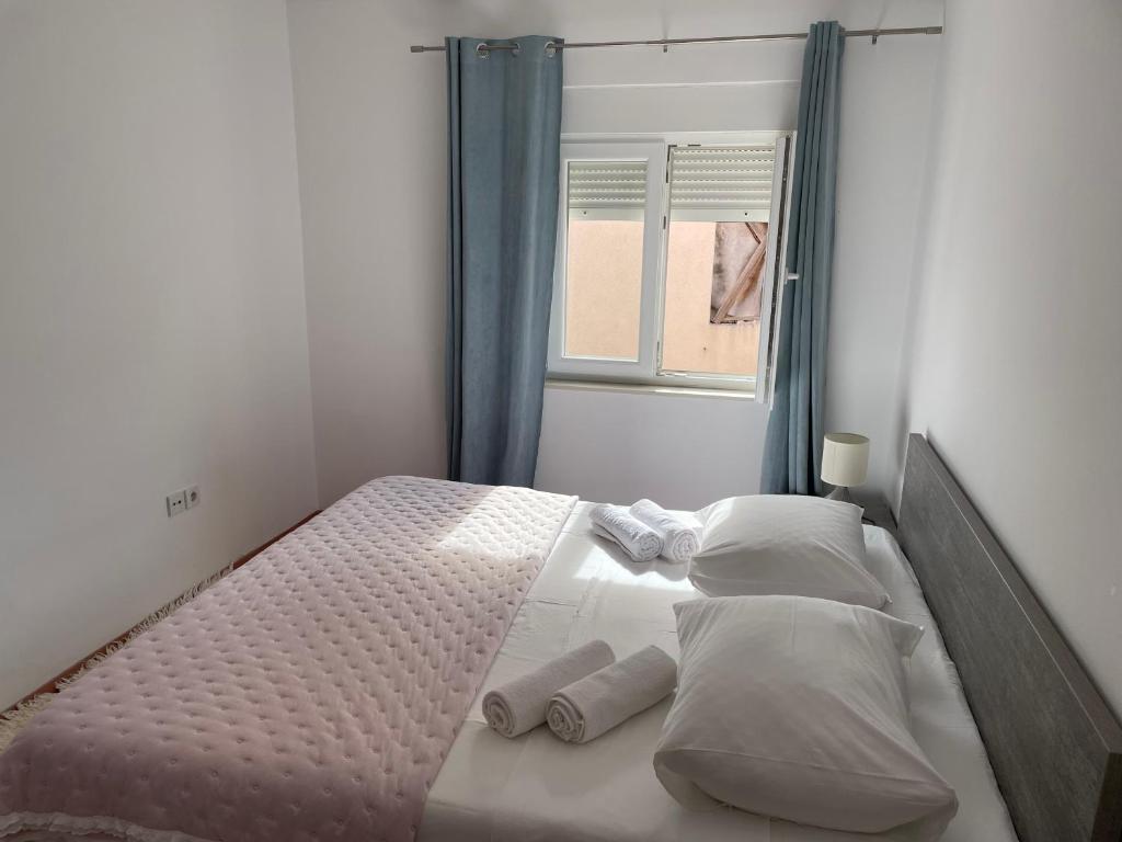 Posteľ alebo postele v izbe v ubytovaní Apartments Dumina