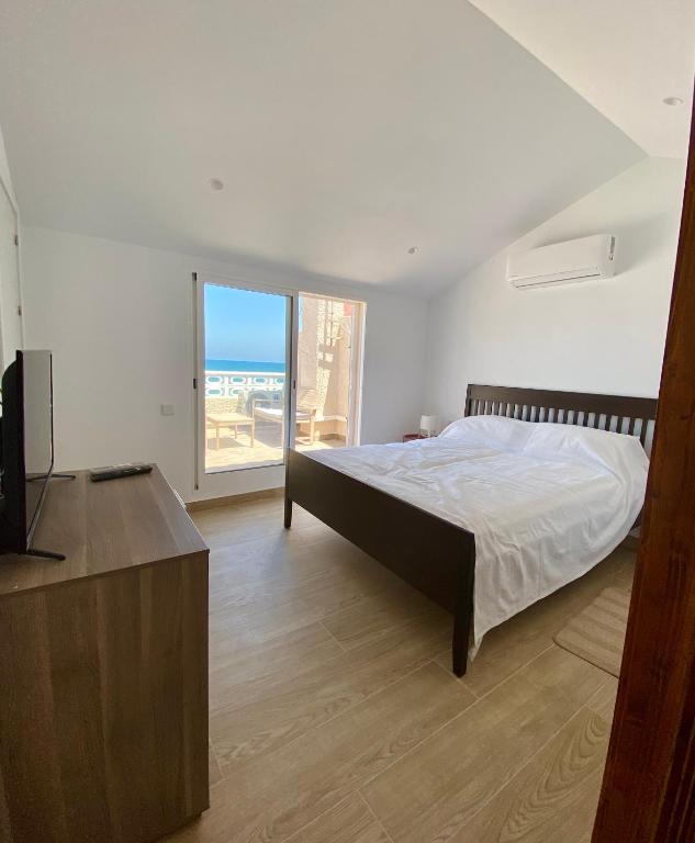 Modern beachfront townhouse, El Perelló – Updated 2023 Prices