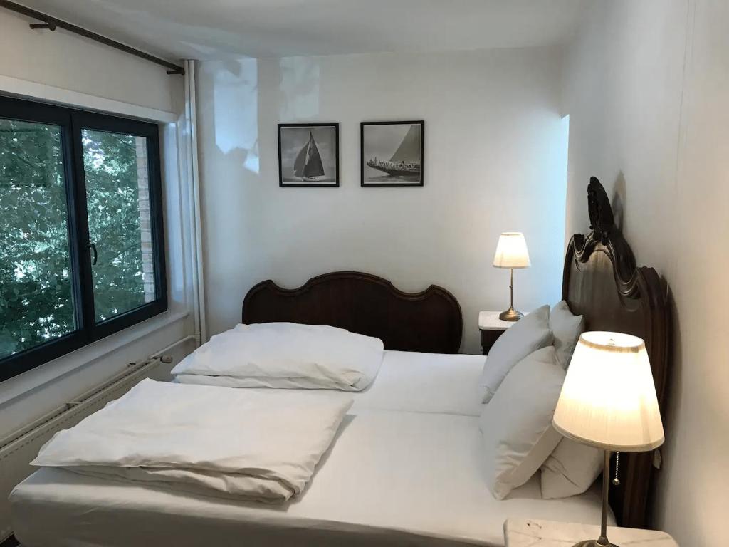 Postel nebo postele na pokoji v ubytování Holiday home Keysersnest