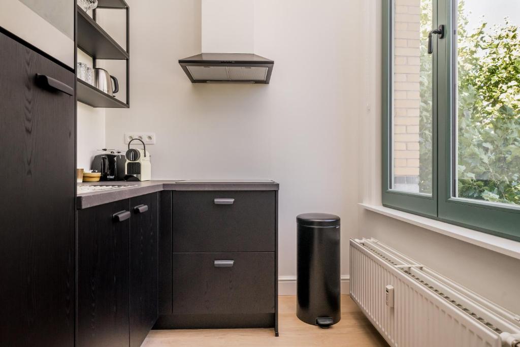 Kuchyň nebo kuchyňský kout v ubytování Quartier Le Sud